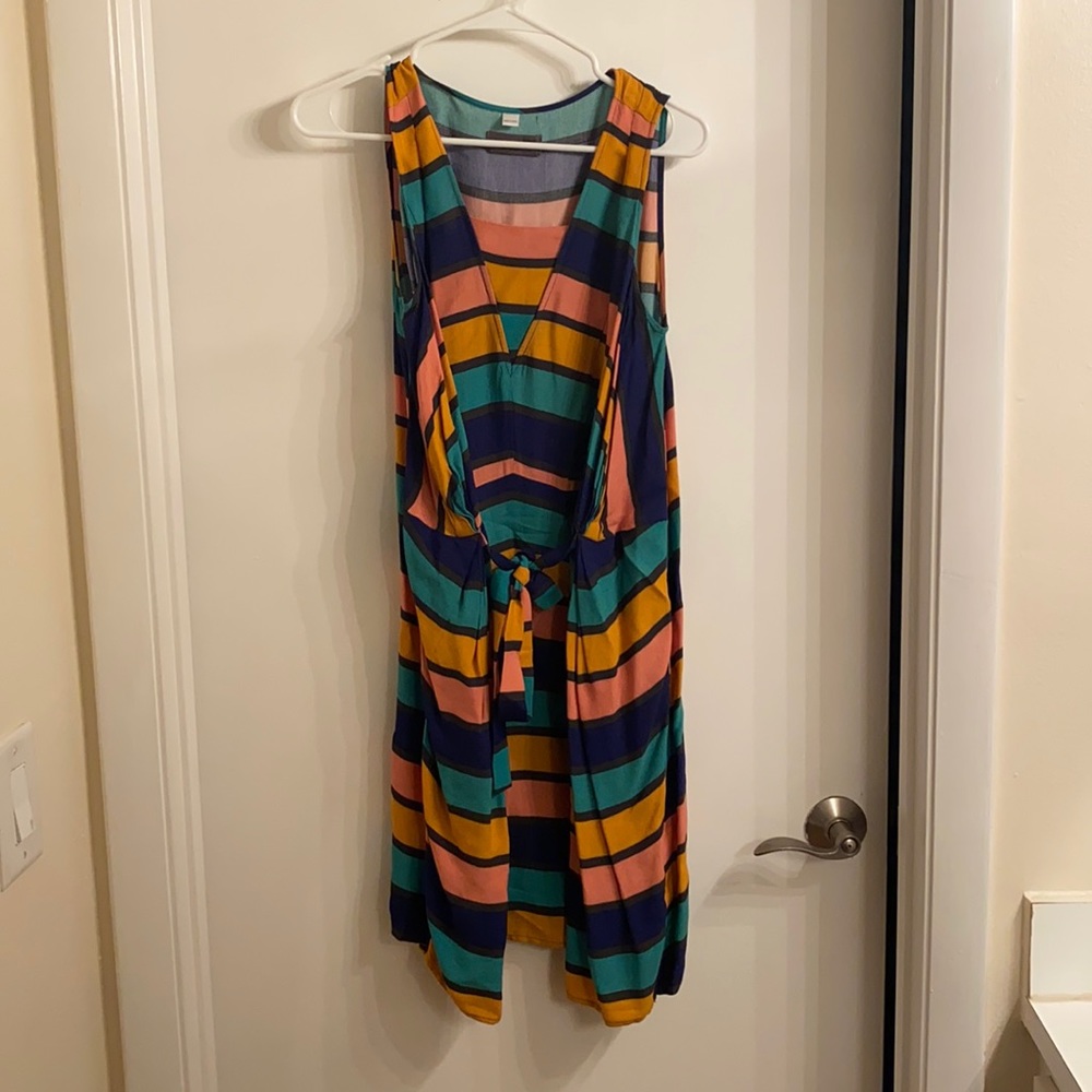 dress with pleated, tie front; above knee length